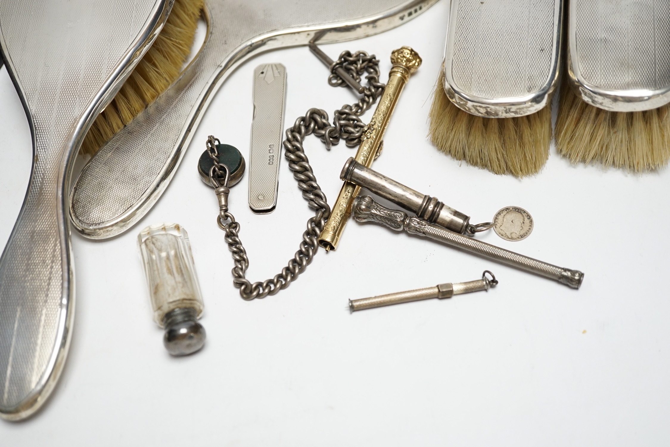 Sundry silver and other items including a four piece mirror and brush set, propelling pencils, silver albert and hatpins including three silver by Charles Horner.